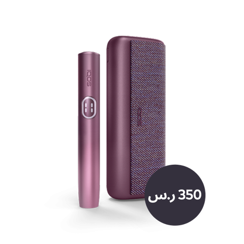 A garnet red IQOS ILUMA i PRIME device and holder.