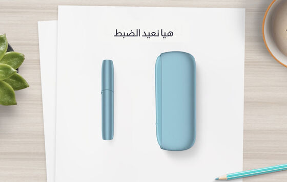 IQOS Originals DUO holder and pocket charger in turquoise color.