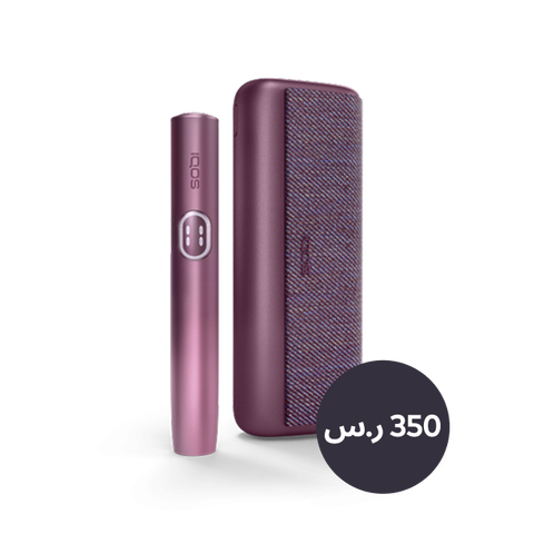 A garnet red IQOS ILUMA i PRIME device and holder.