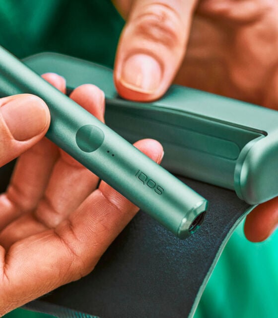 A woman holding travel documents.