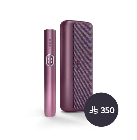 A jade green IQOS ILUMA PRIME device and holder.